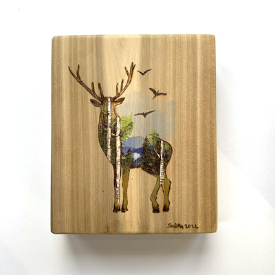 Original wood burned and hand painted art featuring landscape of scene of Mount Sentinel inside an elk