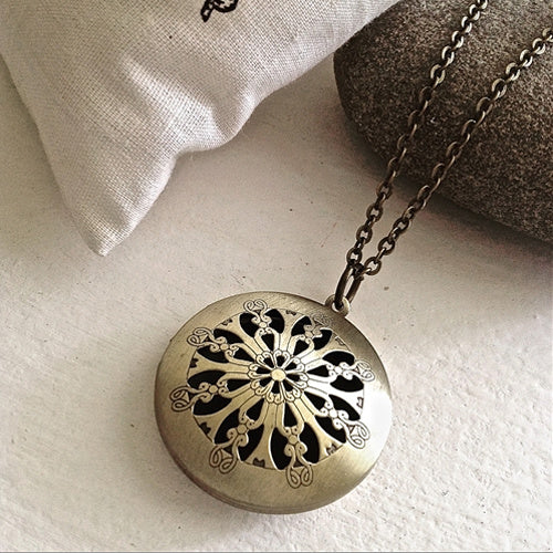Antique ornate brass locket necklace